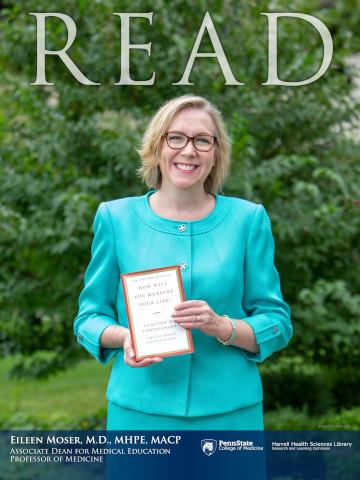 2018 Read Poster honoree holding her book: How Will You Measure Your Life