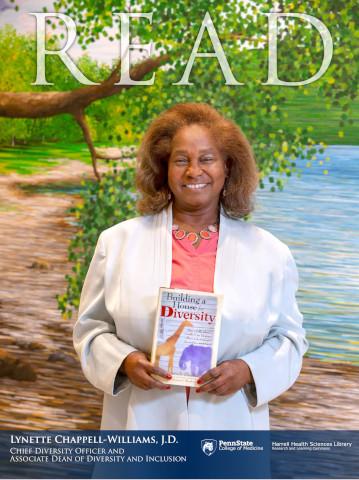 2018 Read Poster Honoree Lynette Chappell-Williams holding the book: Building a House for Diversity