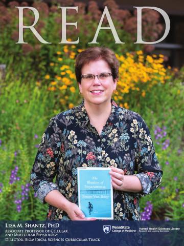Photo shows the 2019 read nominee Lisa Shantz holding the book she recommended: The Illusion of Separateness